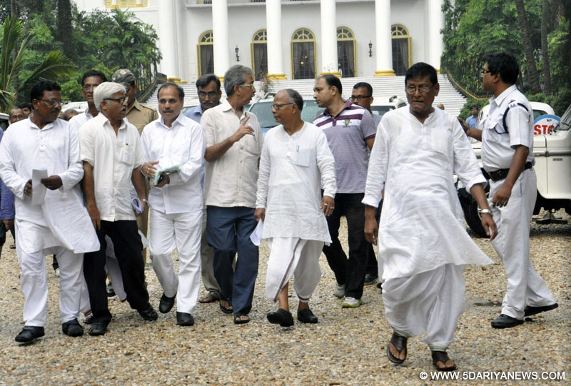 CPI-M state secretary Surja Kanta Mishra, West Bengal Congress president Adhir Ranjan Chowdhury , other Congress and Left leaders come out after meeting with West Bengal Governor Keshari Nath Tripathi at Raj Bhawan in Kolkata, on May 23, 2016. 